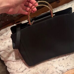Elegant Black Handbag with Gold Accents
